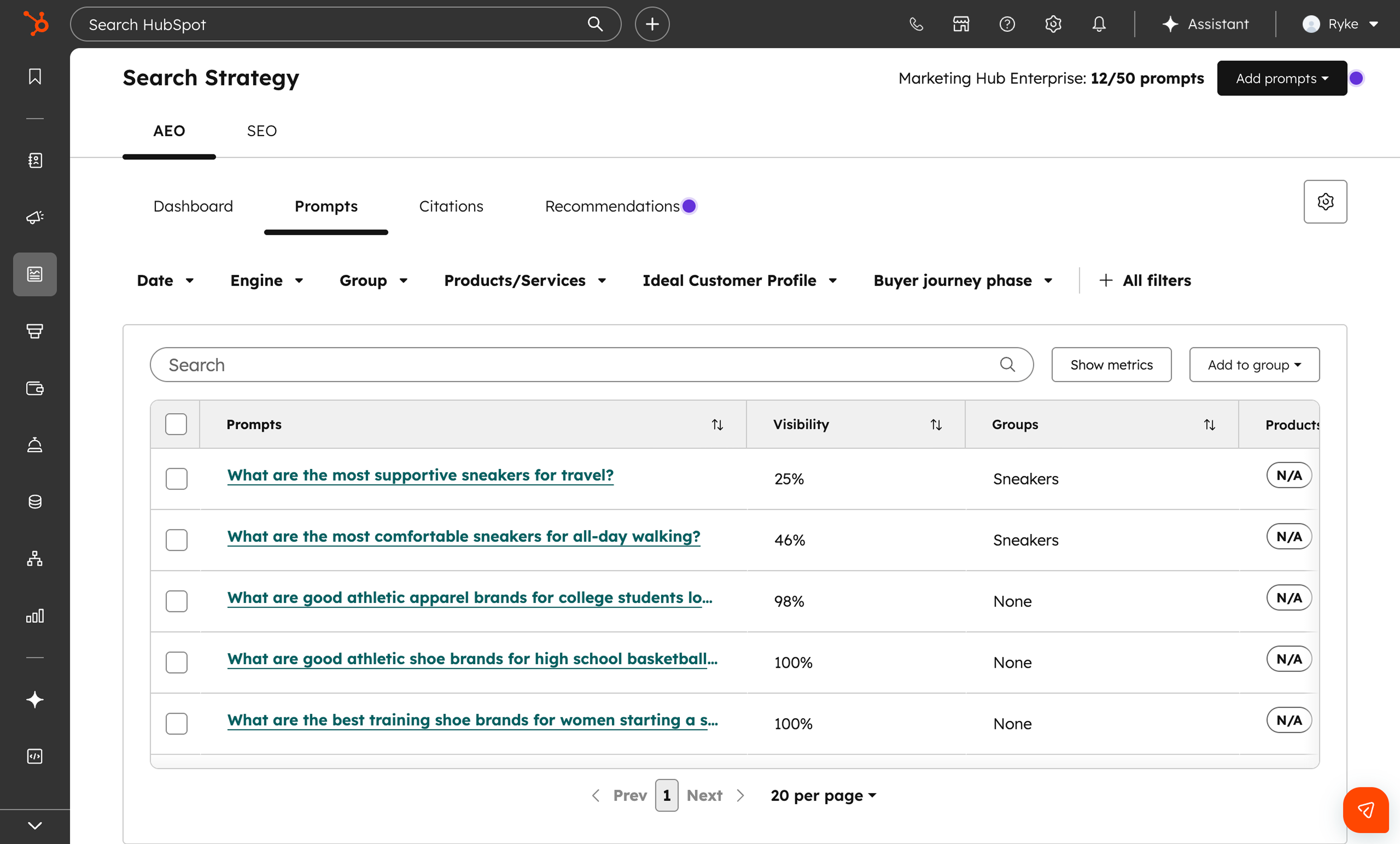 HubSpot AEO prompts tab showing tracked buyer questions across answer engines